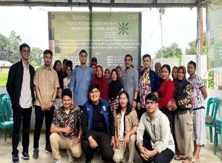Community Empowerment Through the Integration of Palm Oil Waste Processing for Biogas Production and Straw Mushroom Cultivation in Tadukan Raga Village