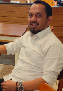 M. Adenin Ginting