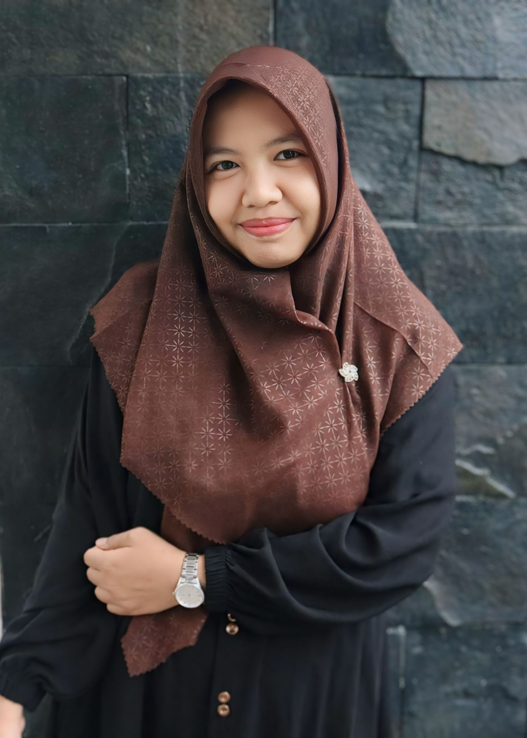 Erna Januarini, S.S M.Si
