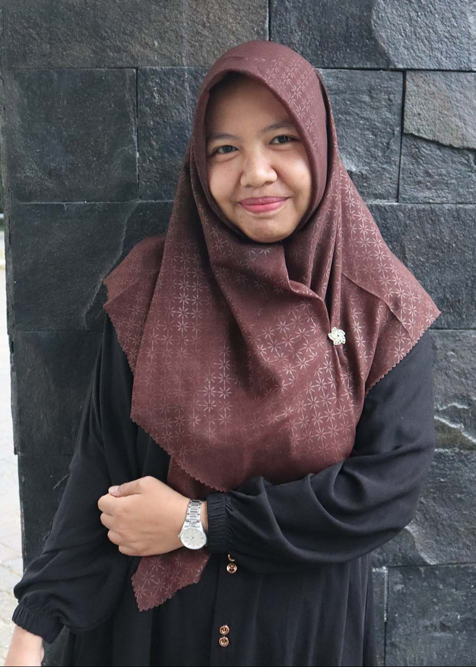 Erna Januarini, S.S M.Si