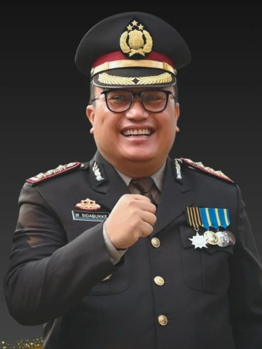 Kombes Pol. Monang Sidabukke, S.Si, M.Si