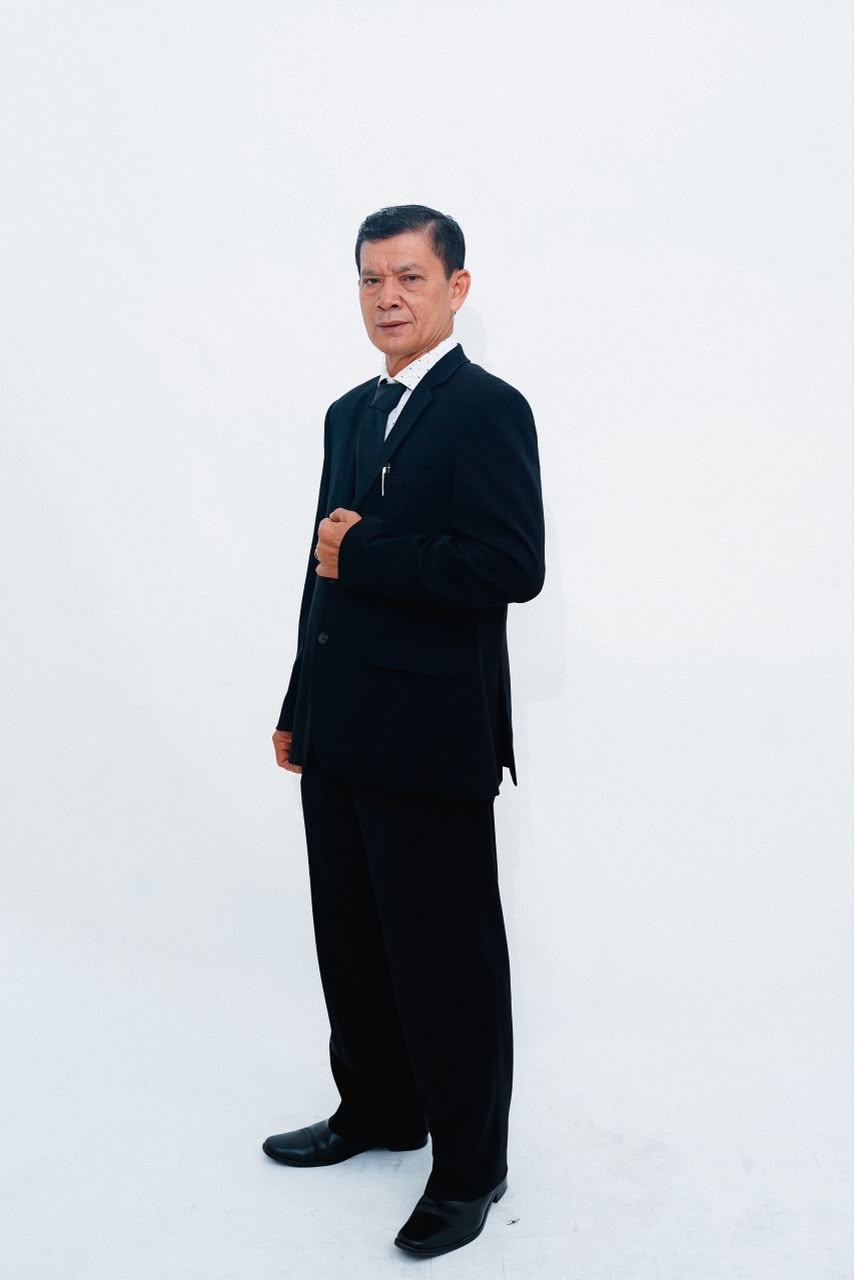 Dr. Tomson Sibarani  S.S., M.Hum.