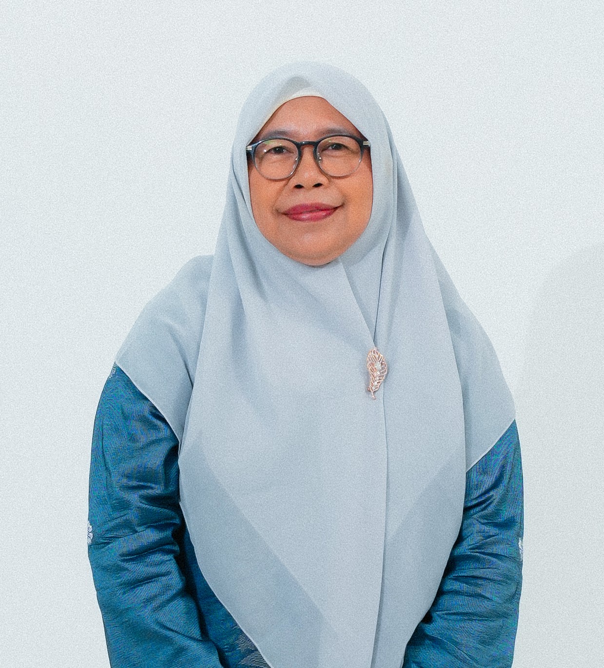 Prof. Dr. Ir. Hamidah Harahap, M.Sc.
