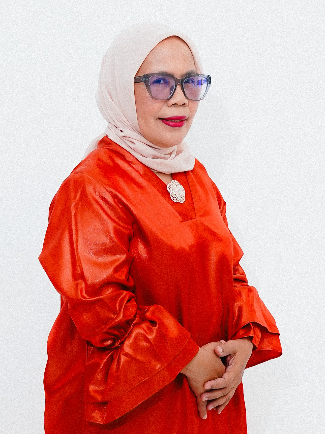 Dr. Dra. Linda Elida, M.Si
