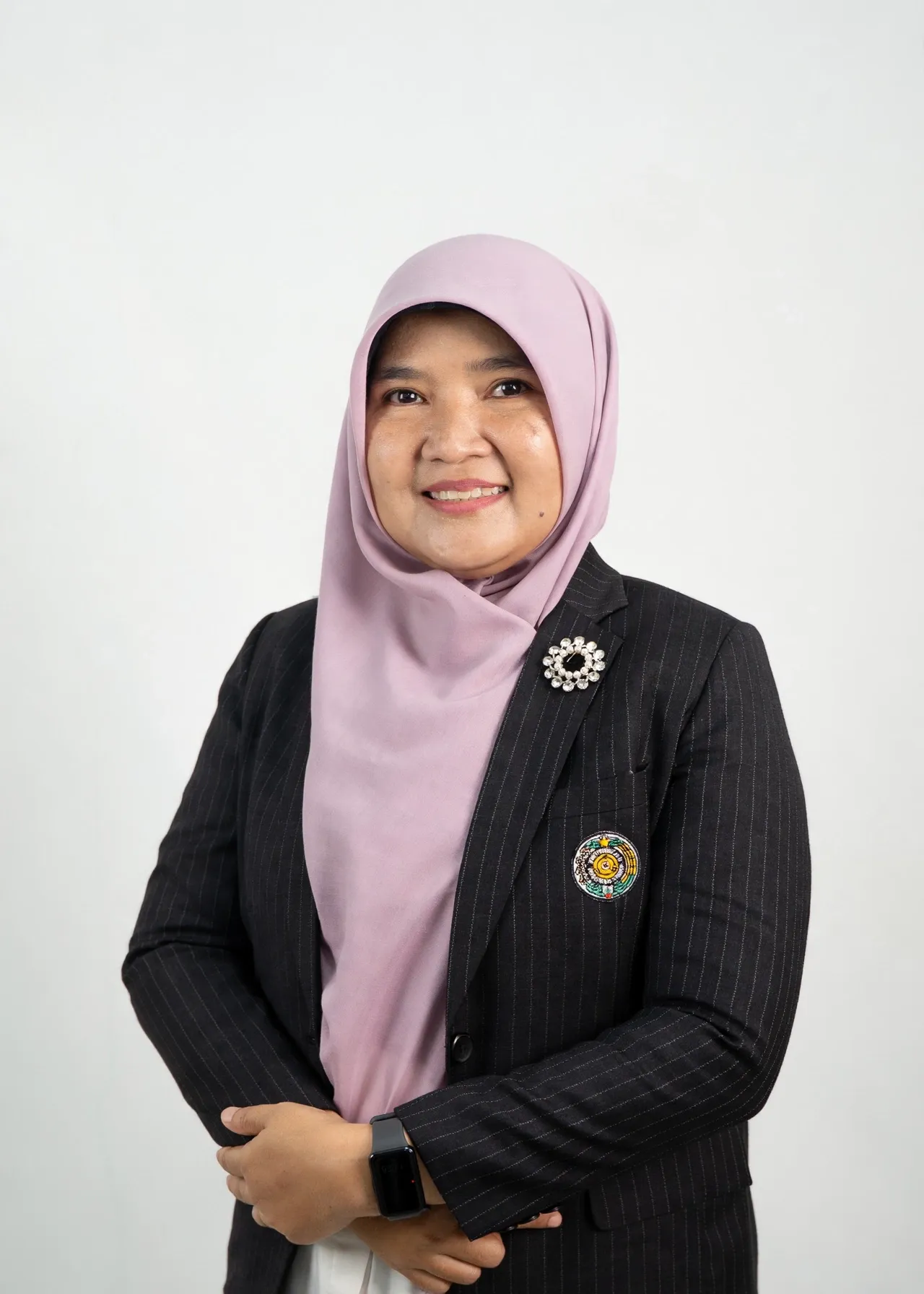 Dr. Nelly Anna, S.Hut., M.Si.